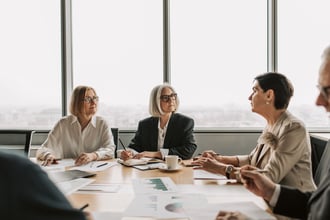 women discussing organisational risk