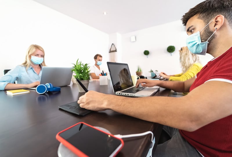 working-at-a-distance-in masks